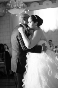 Joi dancing with her father. 